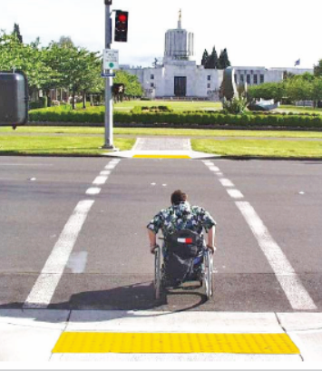 Pedestrian crosses during an LPI phase (FHWA) 